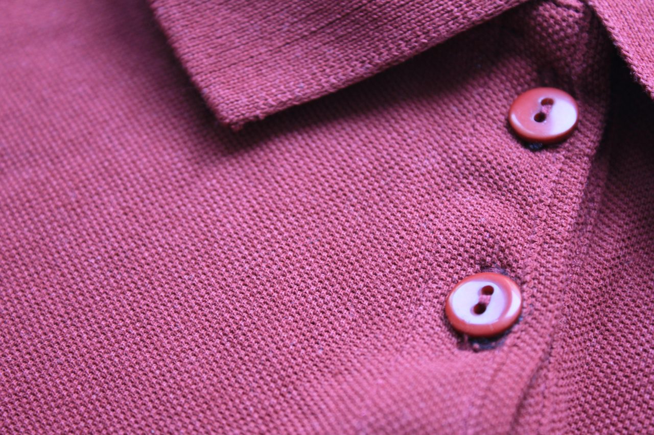 Polo,Shirt,Close,Up,With,Buttoned,Collar,Neck,Of,Purple,